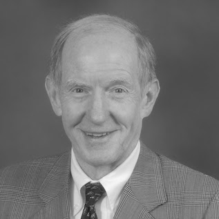 Dr. Ed Holmes, Director of the Board
